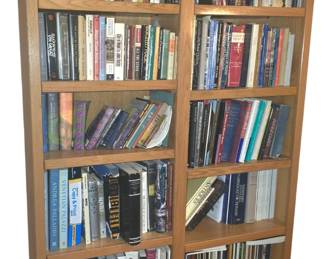 Bookcase with collection of books on antiques, travel, foreign languages and auction catalogues