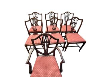 Set of six Hepplewhite style carved mahogany Side chairs with an associated armchair. 