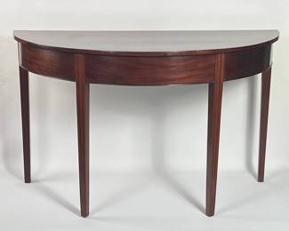 Demi Lune... and, yes, it is a pair... in some of the photos it's set up in the round, with four chairs. Great multi-function furniture for elegant homes!