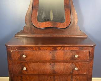 Large Empire Dresser. The undulating curves of the mirror are an unexpected joy!