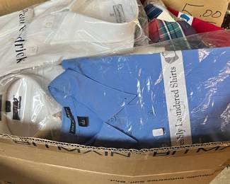 Large amount of mens dress shirts still in the package. Joseph A Banks and other brands