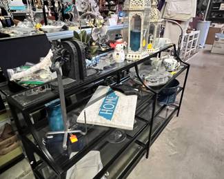 This glass shelf stand has plenty of room for home decor