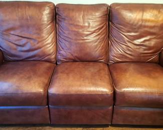 NICE CLEAN LEATHER SOFA W RECLINING FOOT RESTS