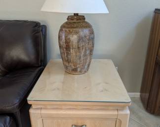 Large glass table top dinning room set with matching buffett, end tables, coffee table and entry table and mirror