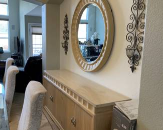 Large glass table top dinning room set with matching buffett, end tables, coffee table and entry table and mirror