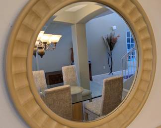 Large glass table top dinning room set with matching buffett, end tables, coffee table and entry table and mirror