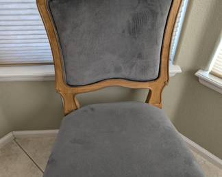 Magnolia Chairs and dinning room table with fold out leaf in the middle