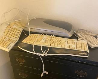 Photo Printer And Plenty Of Keyboards 