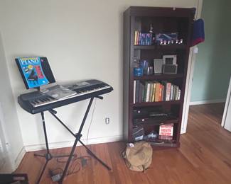 Keyboard, books, Boy Scout backpack and hear