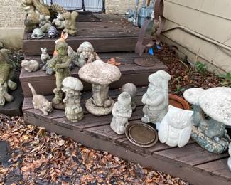 Large assortment of concrete critters and mushrooms 