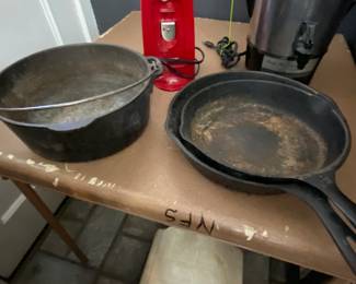 Assortment of cast iron Skillets and Dutch Oven 