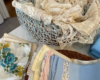 Large assortment of antique doilies