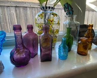 Assortment of colorful miniature vases