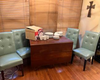 Drop leaf table. Top will need to be refinished. Quality table 