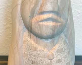 Stone carving “Lady in Hair Flow” by Taos Pueblo artist John Suazo