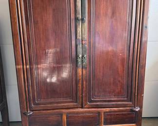 Chinese Qing Dynasty cabinet/armoire, with brass hardware, possibly rosewood