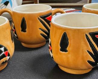 Mid-century coffee mugs with southwestern motif