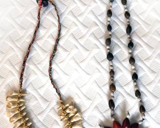 Tooth necklace, possibly elk + job's tears seed necklace