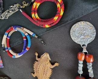 Beaded eyeglass holders, horny toad,  New Mexico bicentennial necklace from Nambe