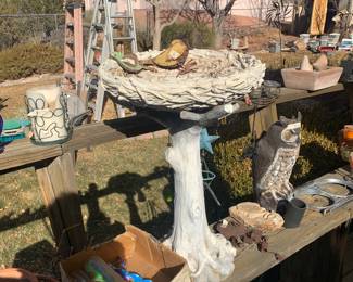 yard art and ladders