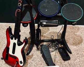 Wii Band Hero in Box. Includes Guitar/Drum Kit/Microphone and Game.