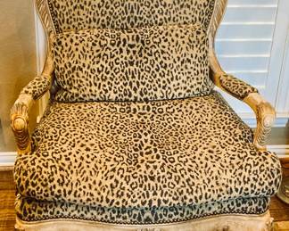 French Louis XV Style Gilt and Painted Bergere Chair with a Leopard Print Upholstery.