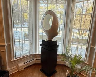 Abstract sculpture on pedestal