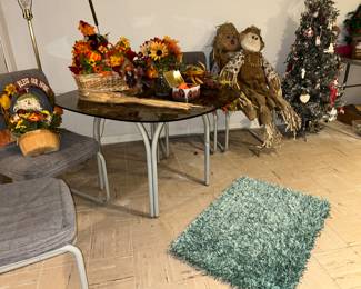 Glass topped table with 4 chairs