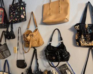 Purses and tote bags along with gloves and hats