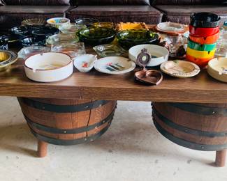 Brothers  Furniture of Kentucky coffee table made from oak barrels--notice the very large vintage ashtray collection