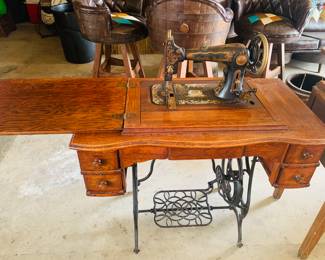 early treadle sewing machine that's been completely refinished