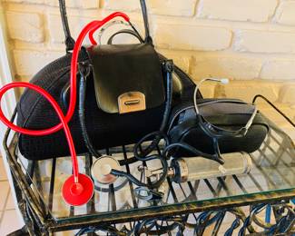the "house call" doctor bag and instruments of Opelousas pediatrician Dr. George Prather--These instruments looked at and listened to many children.   