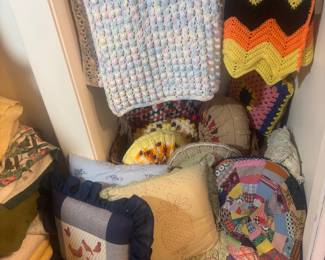 Beautiful crochet blankets and homemade pillows 