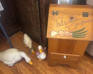 Ceramic ducks and onion/tater bin