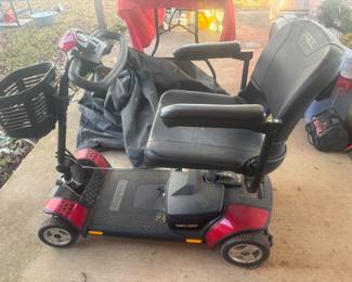Electric scooter. Works great. Has battery charger 