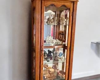 solid oak curio cabinet with five glass shelves