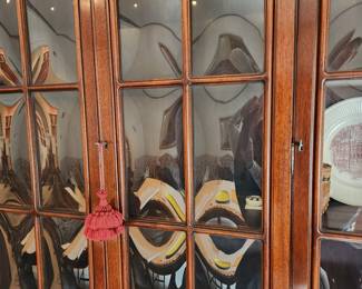Antique, desk-front china cabinet with bubble glass doors