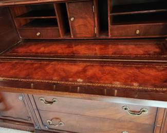 Antique, desk-front china cabinet with bubble glass doors