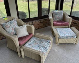 A Cream colored Wicker chair and Rocker! Each has an ottoman! 