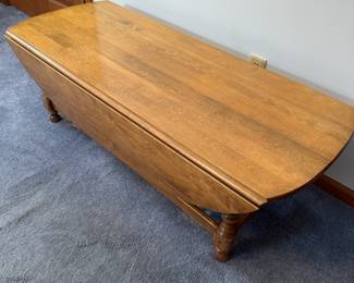 A lovely MCM drop leaf coffee table!