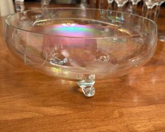 I LOVE this crystal bowl! It is footed with three feet and has a stunning iridescent shine to it.  