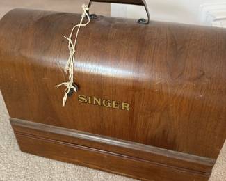 This is a BEAUTIFUL Singer Sewing machine in ORIGINAL Wooden Case with ORIGINAL Key! OUTSTANDING CONDITION! 