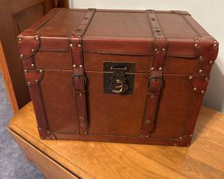 This is a great little side piece! A small leather covered trunk. Lined, and in near mint condition! 