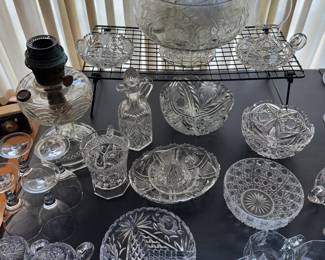 Very nice selection of crystal in just about every form! I especially the beautifully oil lamp! The punch bowl is complete with glasses, hooks and ladle! 