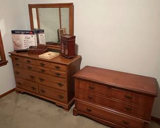 This is a great pair for your bedroom! A terrific long dresser w/ mirror and a TALL BOY Hope Chest by Cavalier!