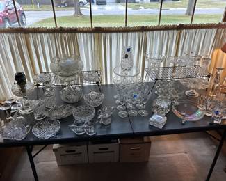 An entire banquet table filled with lovely crystal and cut glass! 