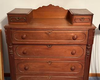 Here is a beautiful Victorian Chest of Drawers! 4 Large Drawers with 3 smaller side drawers in the top. I believe this to be Mahogany.