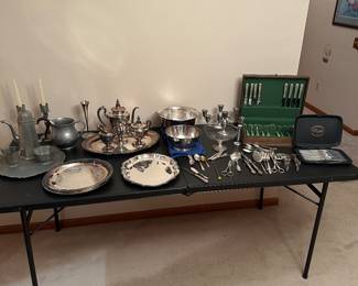 The entire 8 ft banquet tale is filled with Vintage Pewter, Silver Plate and STERLING!