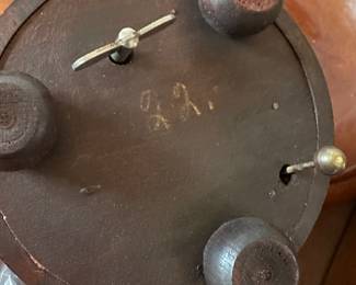 This is a dark wooden round box with music box! 