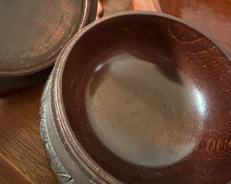 This is a dark wooden round box with music box! 